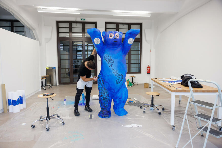 the artist Luka rep and his buddy bear creation